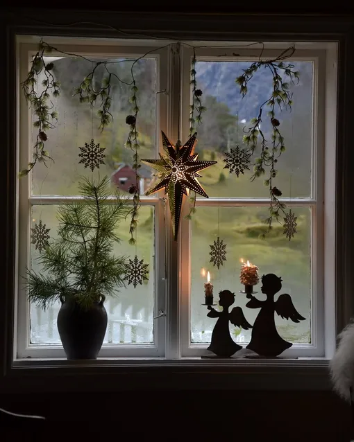 рождественская звезда в окнах