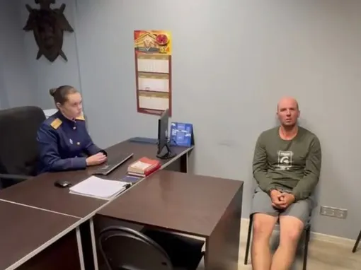 Мужчина на допросе